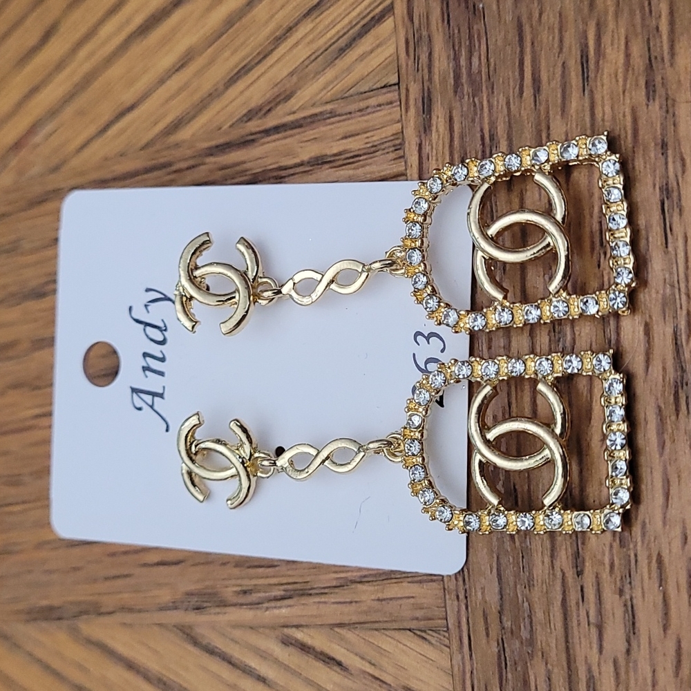 Gold tone double C dangle costume fashion earrings
